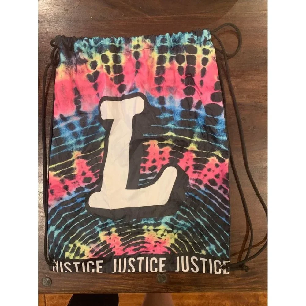 Justice drawstring bag “L” initial, excellent condition (bin T)